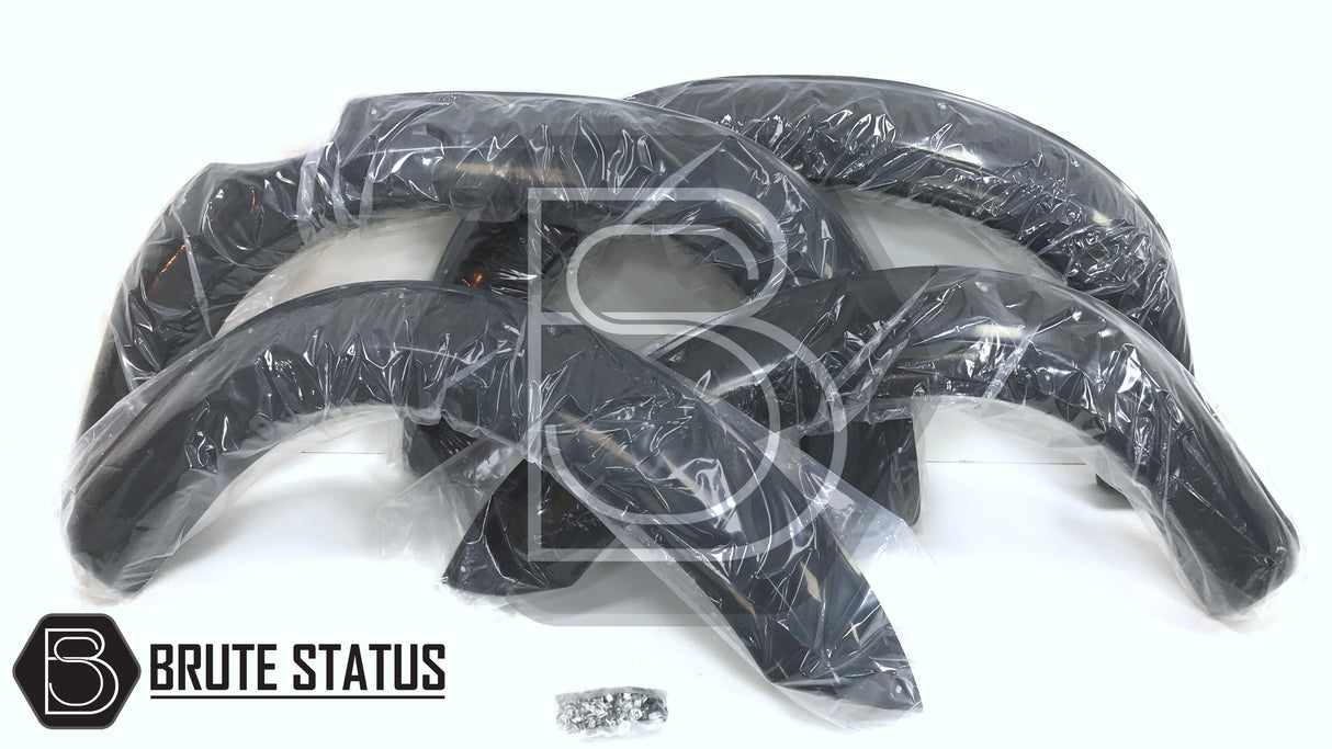 Isuzu D-Max 2016-2019 Wide Arch Kit (Fender Flares) in plastic wrap, showcasing durable ABS plastic construction and sleek design for enhanced vehicle aesthetics.