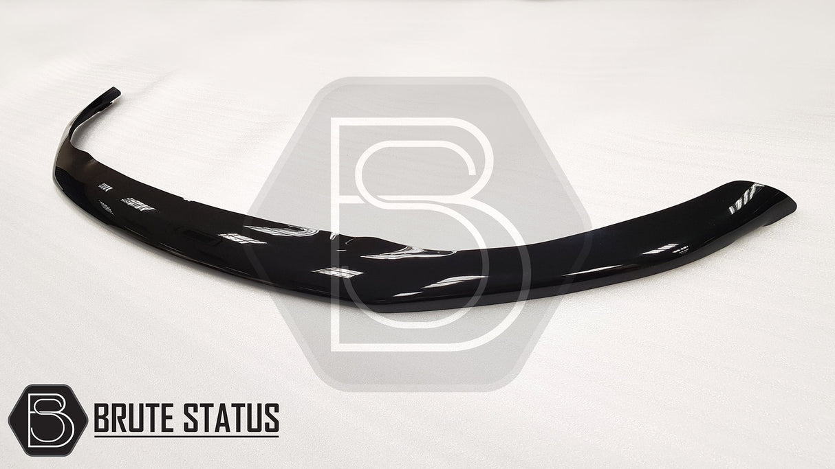 Nissan Navara NP300 2015-2022 Bonnet Guard Stone Deflector/Protector, shown on a white surface, enhances style and protects against bugs and stones.