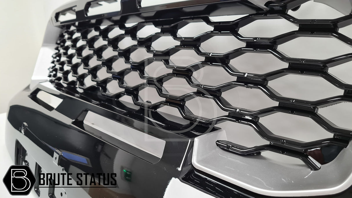 Ford Ranger 2019-2022 T8 Gloss Black & Silver Grille (Wildtrak Only), featuring a robust design with silver inserts, crafted for easy installation without drilling.