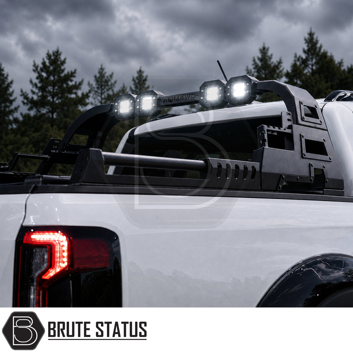 Heavy duty combat style matte black powder coated roll bar fitted to Ford Ranger 2023+ pickup truck offroad 4x4, fitted with additional lighting for extra visibility.