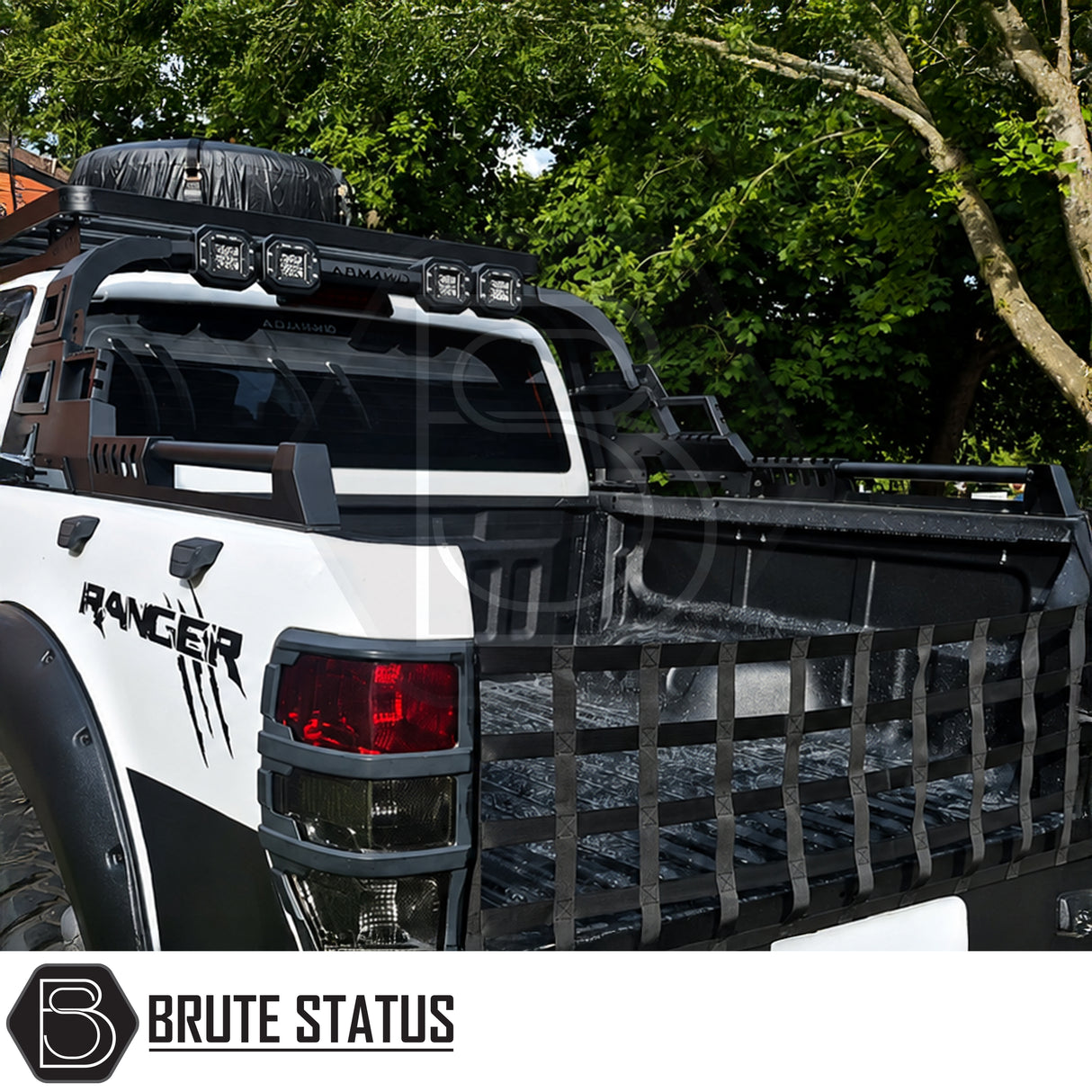 Rear matte black heavy duty carbon steel roll bar fitted to white Ford Ranger offroad 4x4 pickup truck vehicle with fitted LEDs lights.