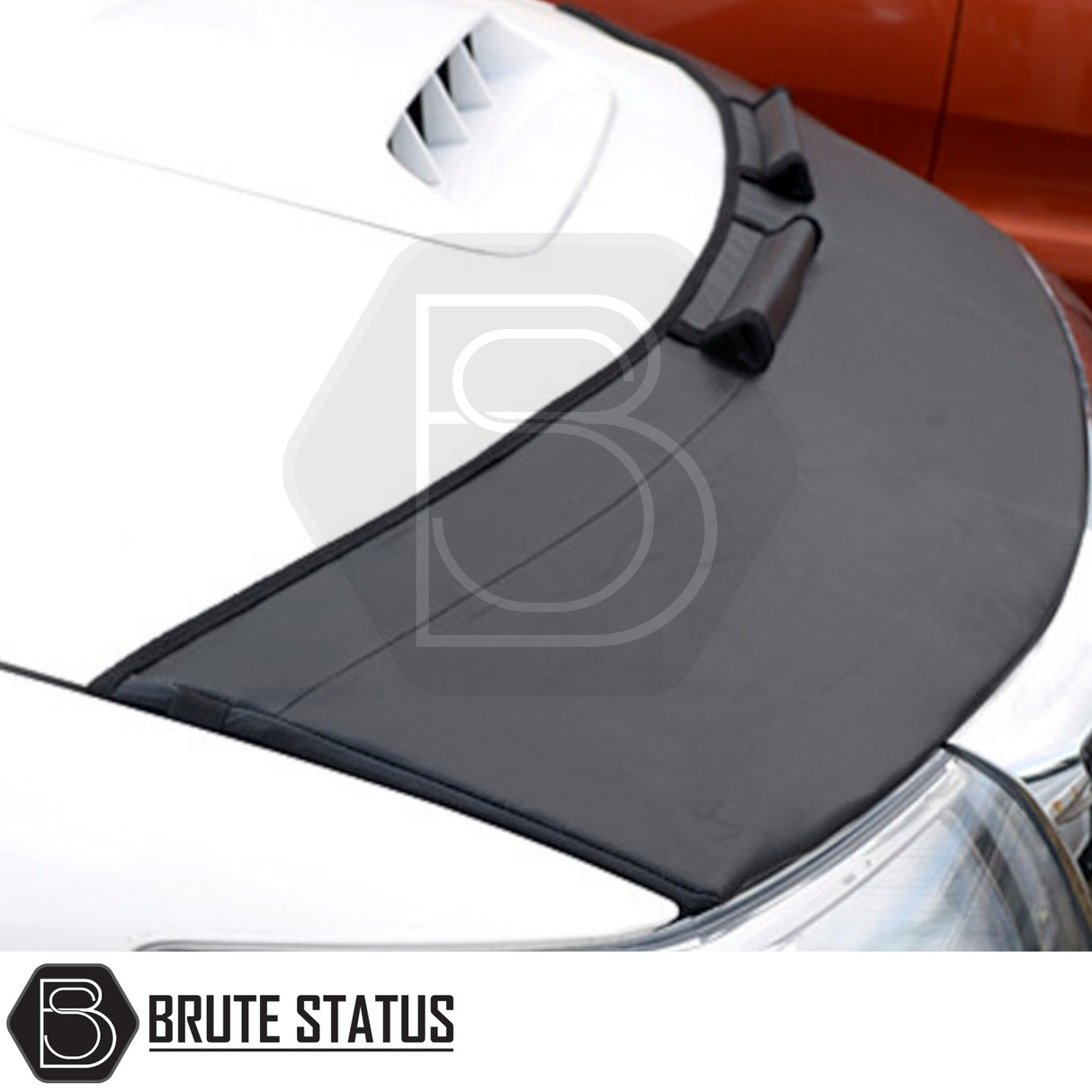 Toyota Hilux 2005-2016 PU Coated Bonnet Bra on car hood, providing robust protection against debris with a custom fit and stylish design.