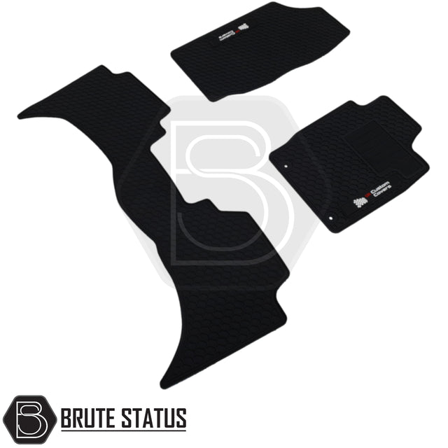 Mitsubishi L200 Series 5 2015-2019 Double Cab Rubber Floor Mats, custom-fit, heavy-duty with logo, non-slip, for right-hand drive, excluding 'Warrior'/'Barbarian' models.