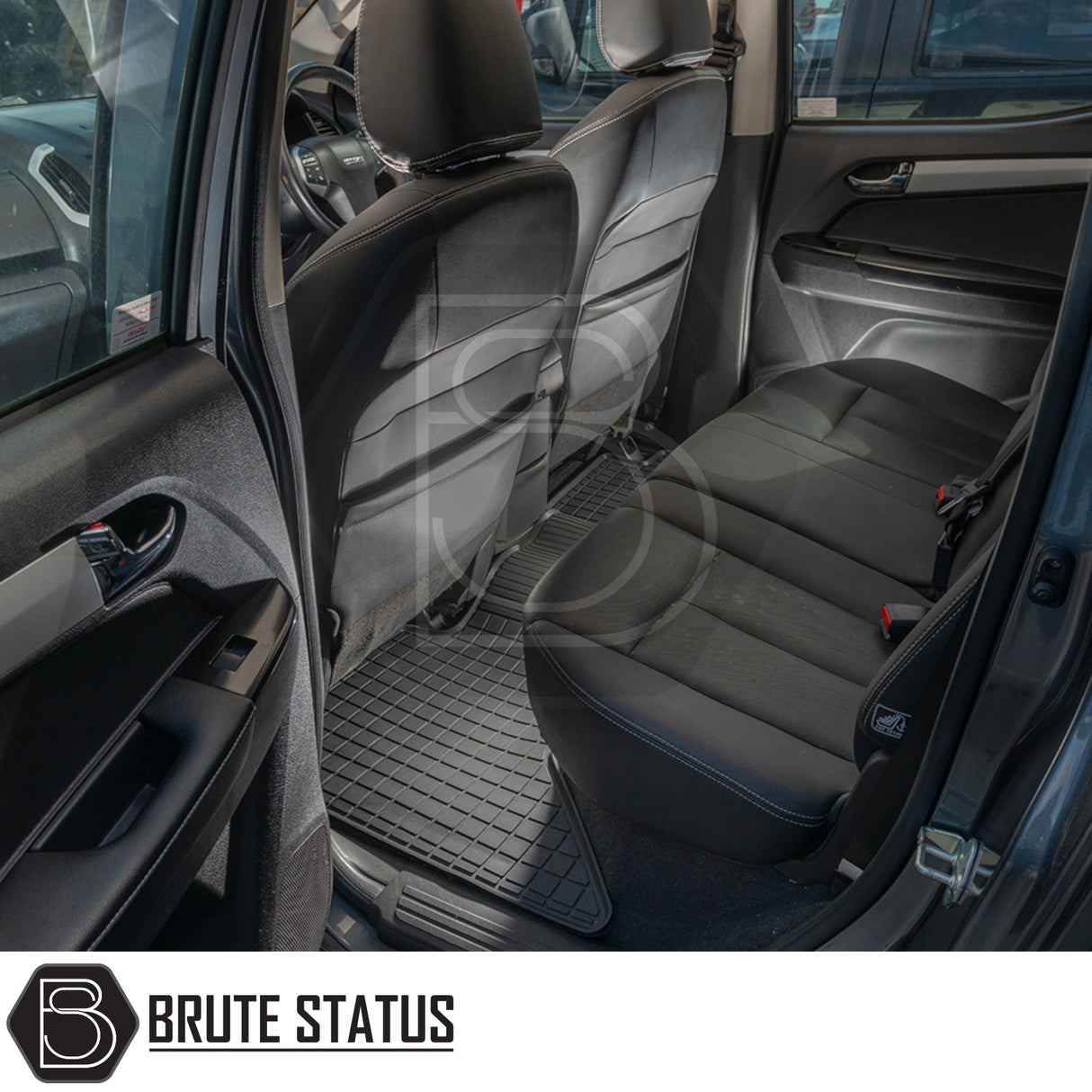 Isuzu D-Max 2012-2020 Double Cab Rubber Floor Mats, heavy-duty and custom-fitted, visible inside a car's back seating area.