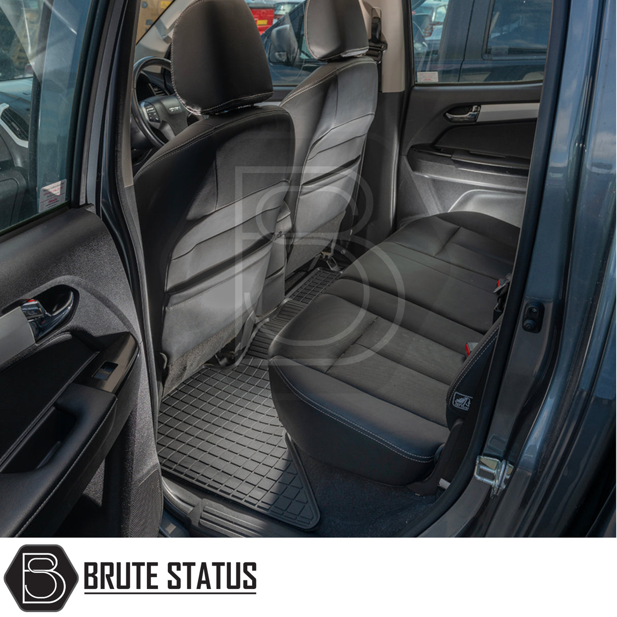 Isuzu D-Max 2012-2020 Double Cab Rubber Floor Mats, tailored for right-hand drive vehicles, shown in a car's back seat, highlighting durability and precise fit.