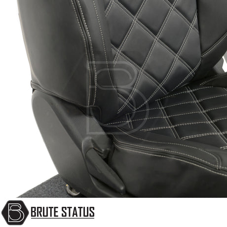 Mitsubishi L200 seat covers with white double diamond Bentley stitch, tailored leatherette design, shown in a close-up highlighting premium material and stitching details.