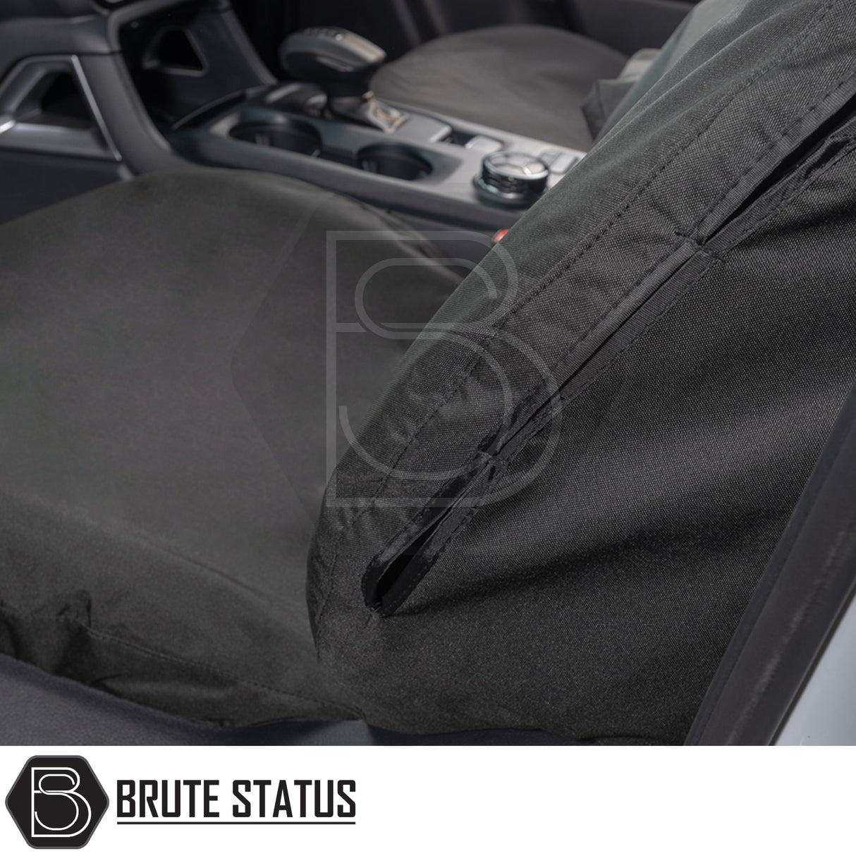 Ford Ranger Wildtrak 2023+ seat covers, branded Brute Status, installed on front seats, showcasing custom fit and premium materials in vehicle interior.