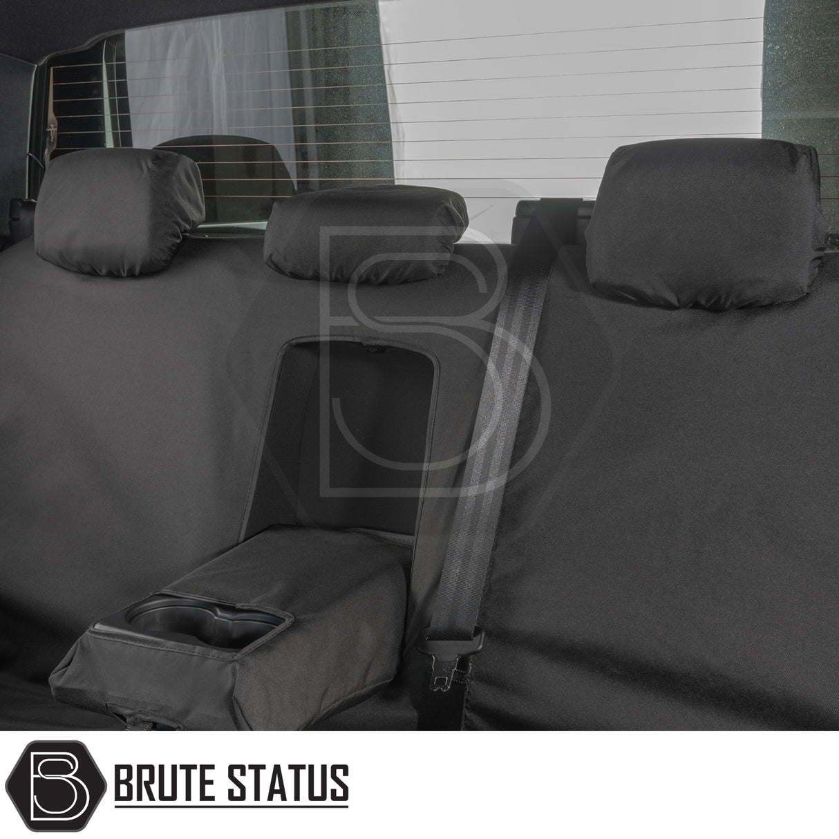 Rear bench of a truck with Brute Status Ford Ranger Raptor T9 2023+ seat covers, featuring padded headrests, armrest pass-through, cup-holder, and seat belt integration.