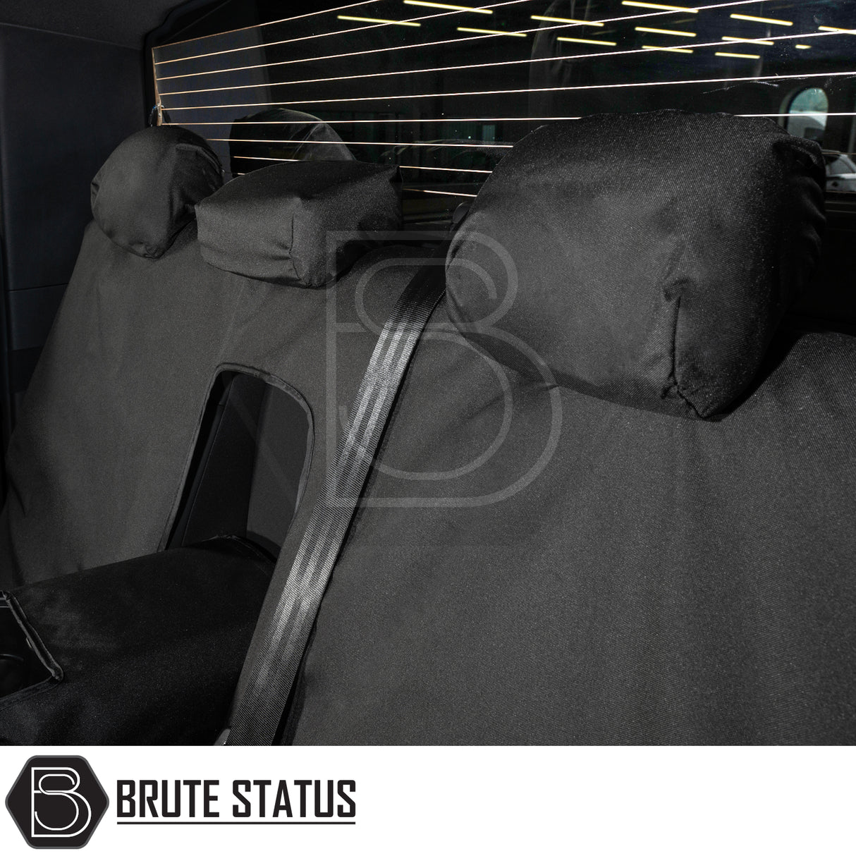 Ford Ranger Raptor T9 2023+ Double Cab Seat Covers, showcasing black Brute Status cover on rear bench, featuring headrest covers and harness openings.