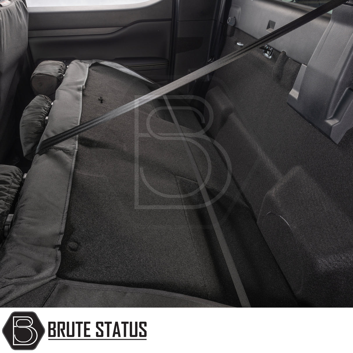Ford Ranger Raptor T9 2023+ Double Cab Cotton-Backed PU Seat Covers protect rear bench with durable, tailored fit, showcasing Brute Status branding.