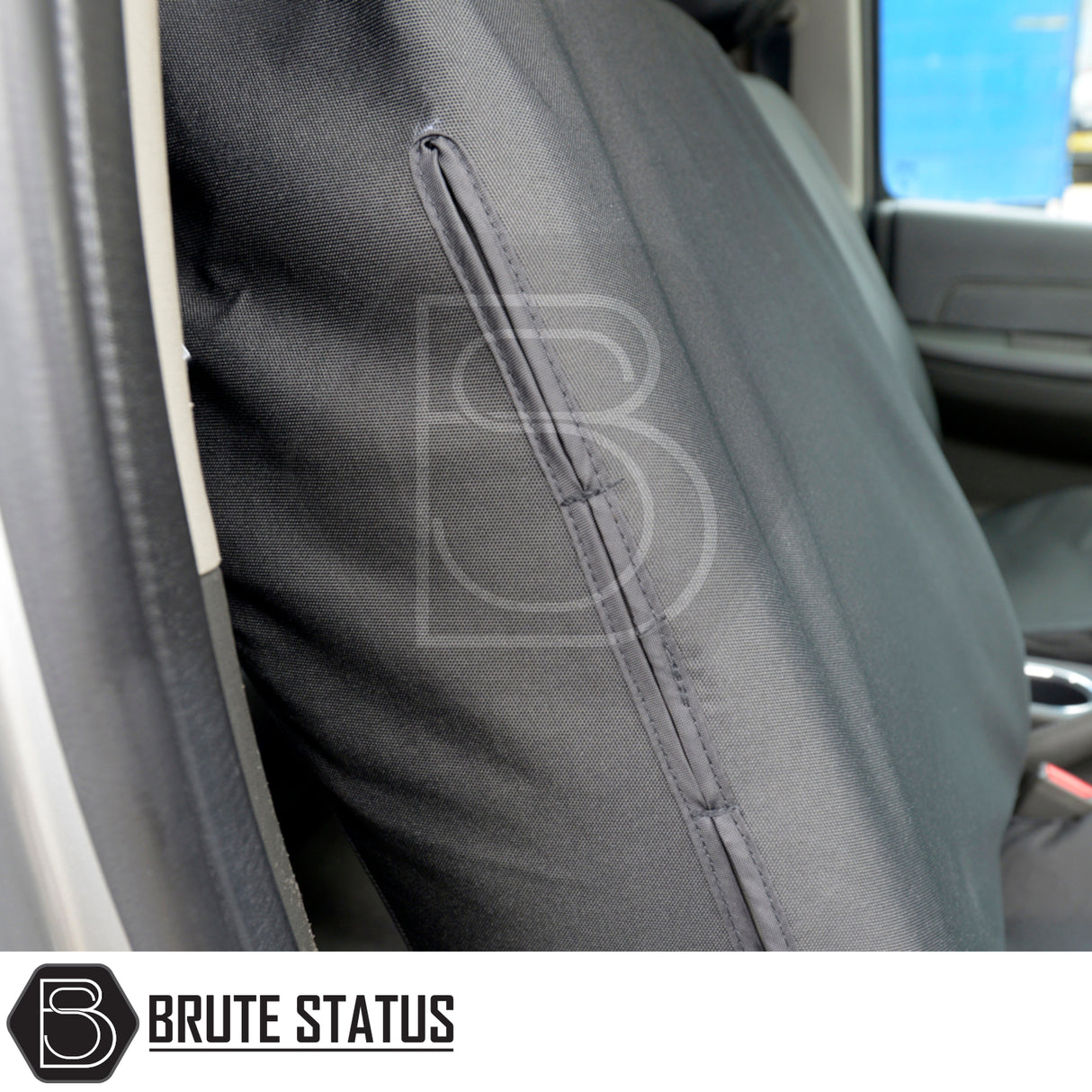 Nissan Navara 2015-2023 NP300 Double Cab Cotton-Backed PU Seat Covers, showcasing textured black fabric and stitching, tailored for a snug fit on the front seat.