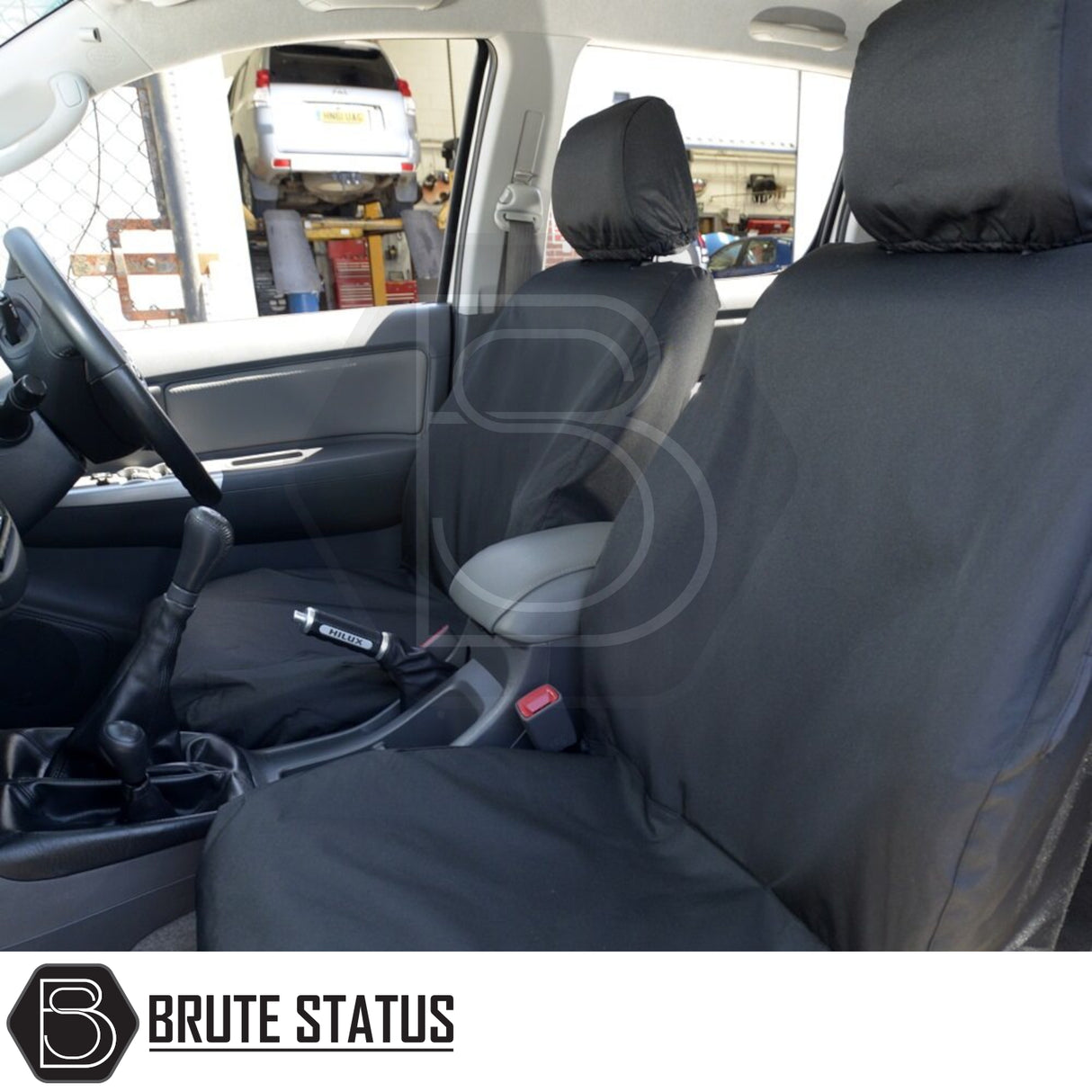 Toyota Hilux 2005-2016 MK6 & MK7 Double Cab Cotton-Backed PU Seat Covers in car interior, showing custom fit on seats and headrests.
