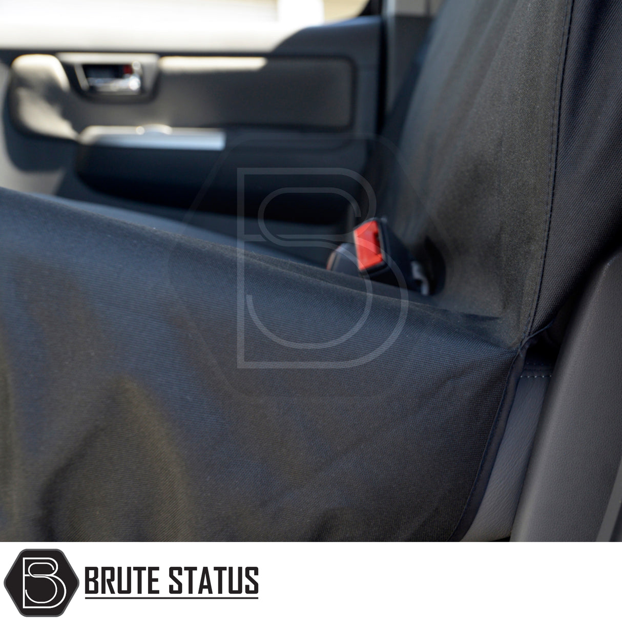 Toyota Hilux 2005-2016 Double Cab Seat Covers, tailored fit, shown in a car with seat belt, highlighting durability and precision for enhanced vehicle interior protection.