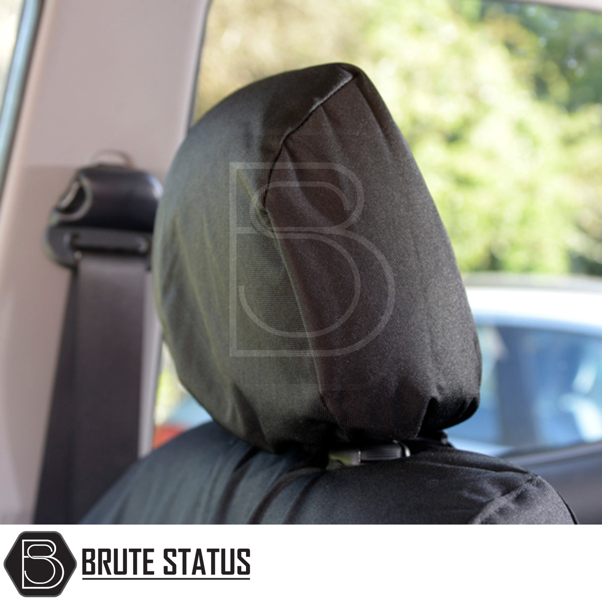 Mitsubishi L200 2005-2015 seat covers, tailored cotton-backed PU, shown on car headrest, emphasizing precise fit and durability.