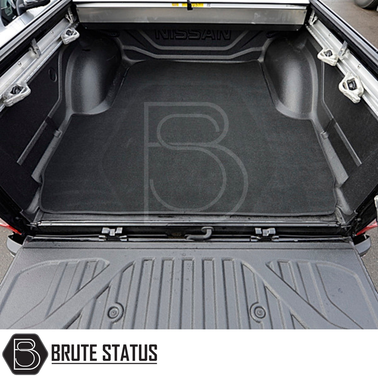 Nissan Navara 2015-2023 NP300 Carpet Load Bed Liner in vehicle trunk, showcasing durable carpet with non-slip backing, tailored fit for secure cargo storage.