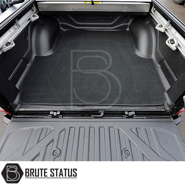 Nissan Navara 2015-2023 NP300 Carpet Load Bed Liner in vehicle trunk, showcasing durable carpet with non-slip backing, tailored fit for secure cargo storage.