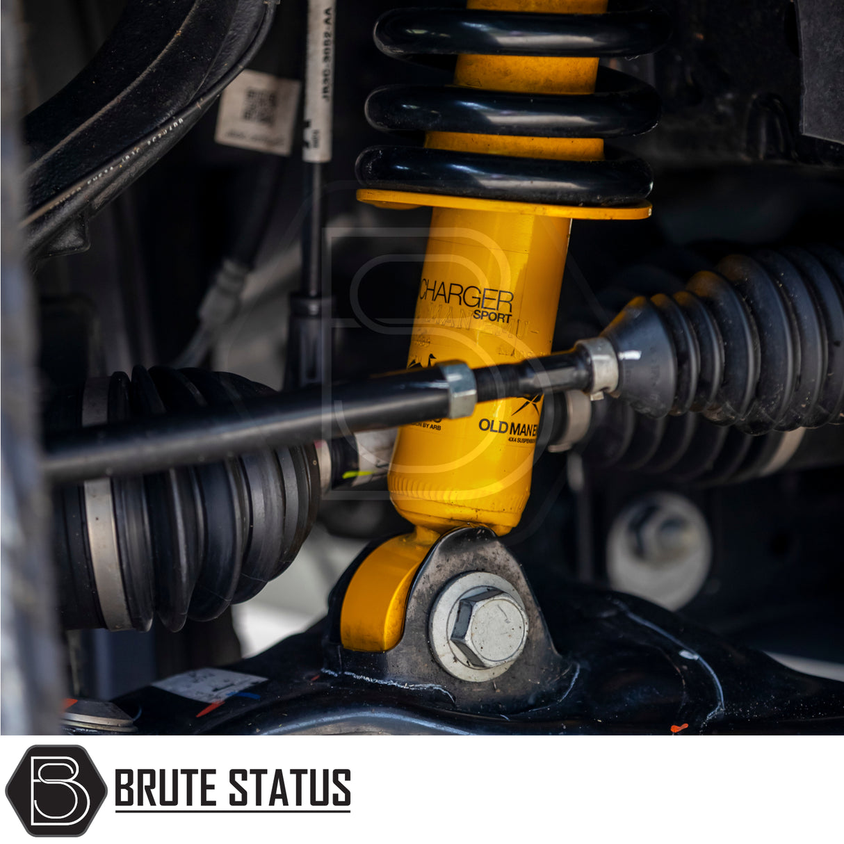 Ford Ranger 2023+ T9 Old Man Emu Nitrocharger 40mm Suspension Lift Kit featuring a yellow “Charger Sport” shock absorber and coil spring for enhanced off-road performance.