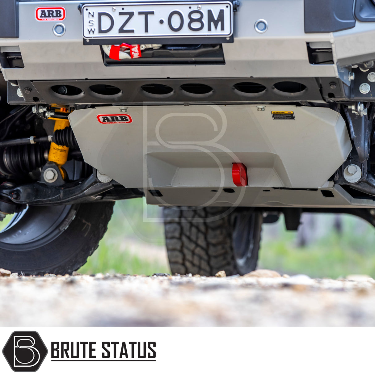 Ford Ranger 2012-2012 T6, T7 & T8 Old Man Emu Nitrocharger Lift Kit with ARB skid plate, visible suspension, and recovery hook, showcasing robust off-road enhancements.