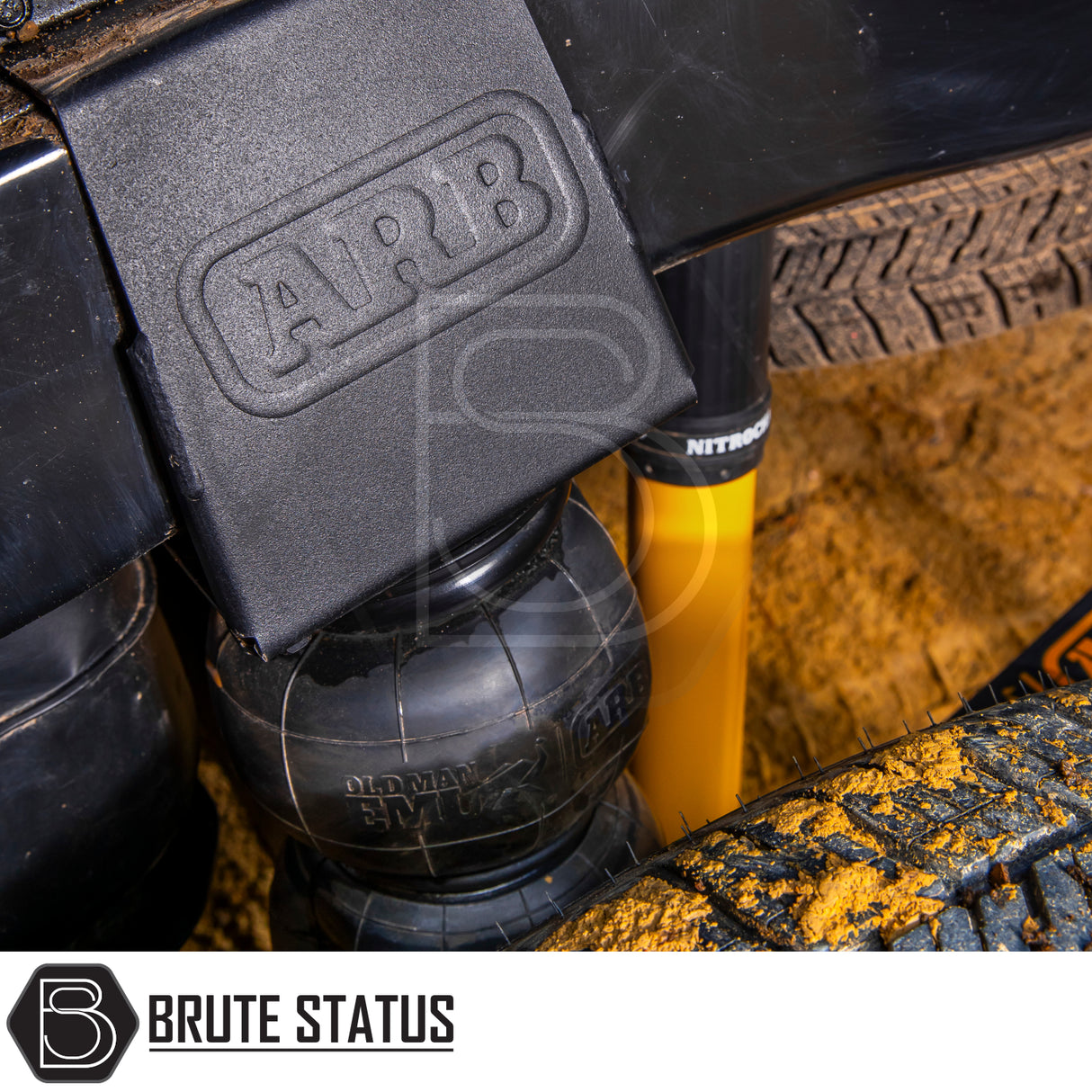 Close-up of Ford Ranger 2023+ T9 Old Man Emu Nitrocharger 40mm Suspension Lift Kit featuring ARB air-spring, yellow shock absorber, enhancing off-road ride and handling.