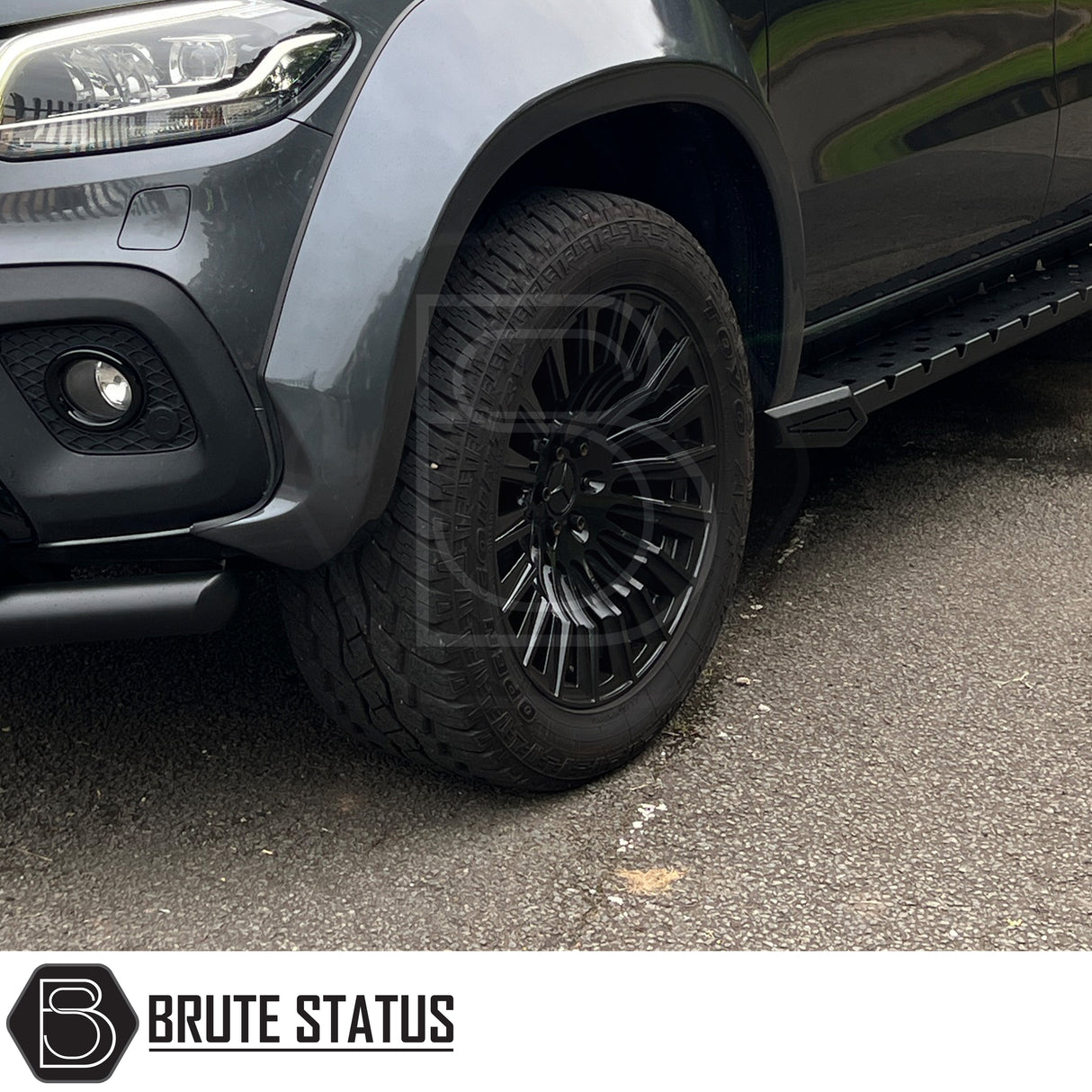 Hawke Wheels Denali XXC alloy rim featuring a central silver logo, designed for customization of pick-up trucks, available in gloss or matt black.