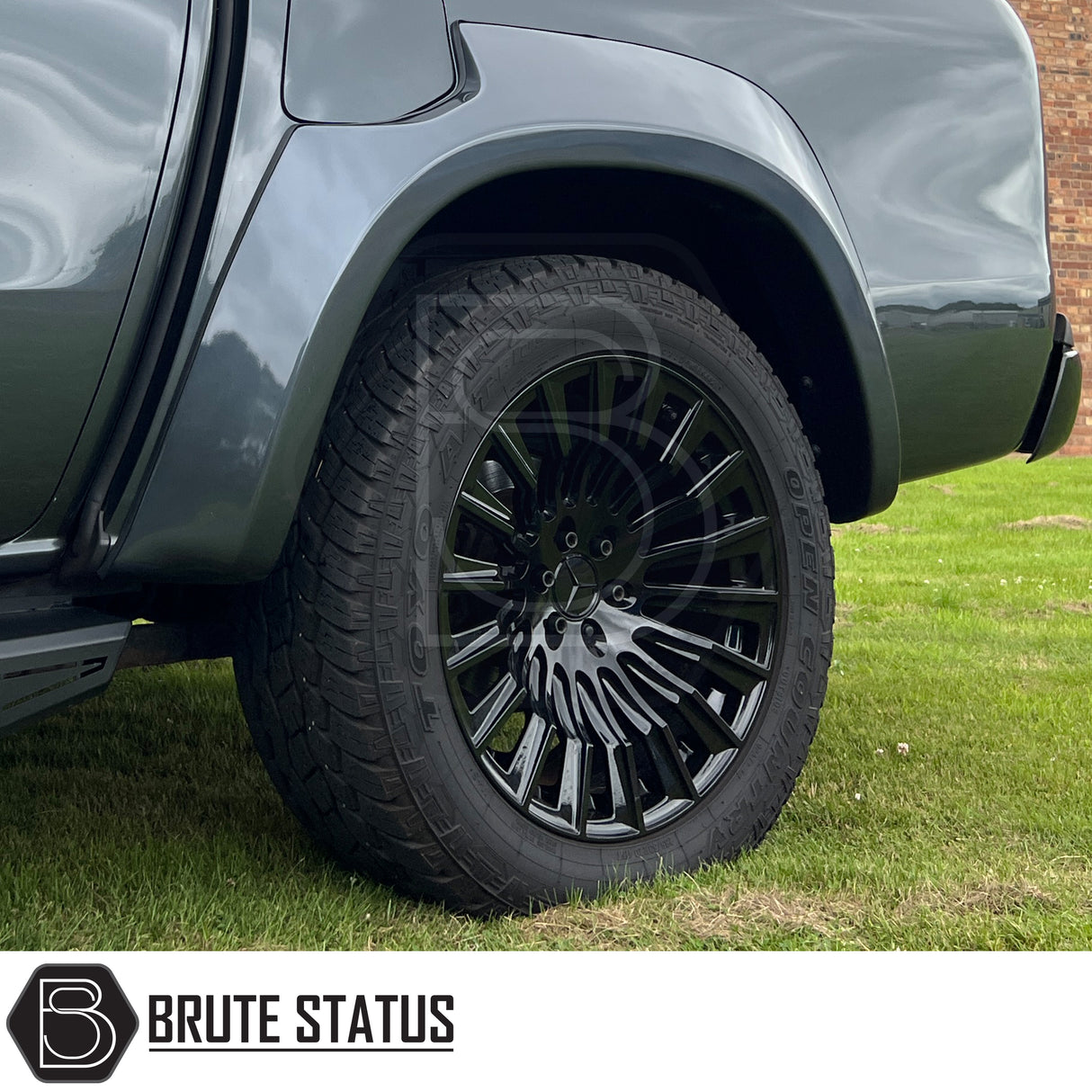 Hawke Wheels Denali XXC alloy rim featuring a central silver logo, designed for customization of pick-up trucks, available in gloss or matt black.