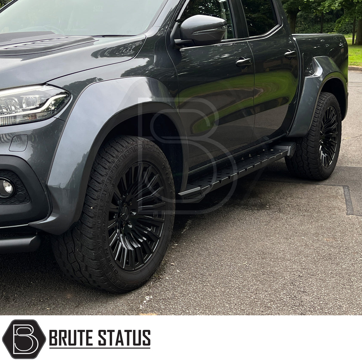 Hawke Wheels Denali XXC alloy rim featuring a central silver logo, designed for customization of pick-up trucks, available in gloss or matt black.