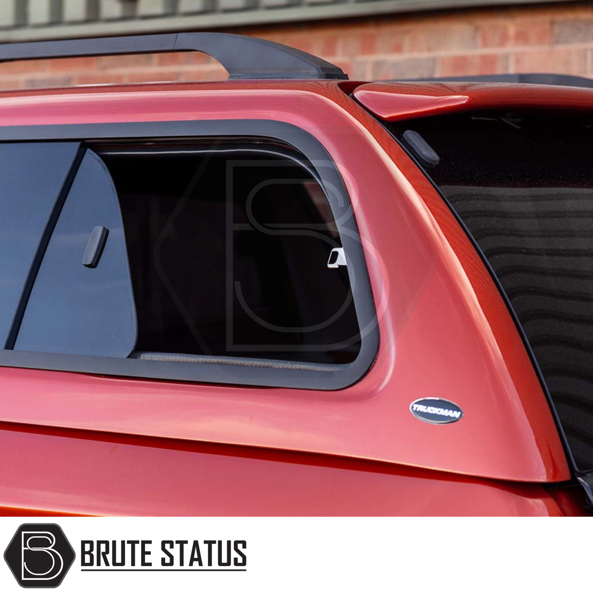 Red Truckman GLS Hardtop Canopy on truck bed, featuring sliding window, black roof-rack, and Brute Status branding. Designed for Fiat Fullback/Mitsubishi L200 2015-2021.
