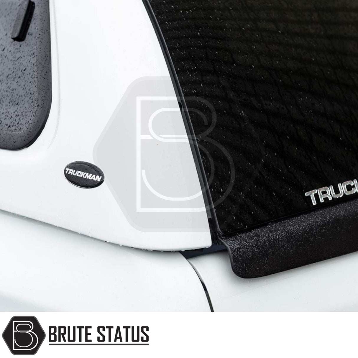 Close-up of Fiat Fullback/Mitsubishi L200 Truckman GLS Hardtop Canopy featuring tinted windows and Truckman badge, showcasing secure, stylish design for enhanced truck utility.