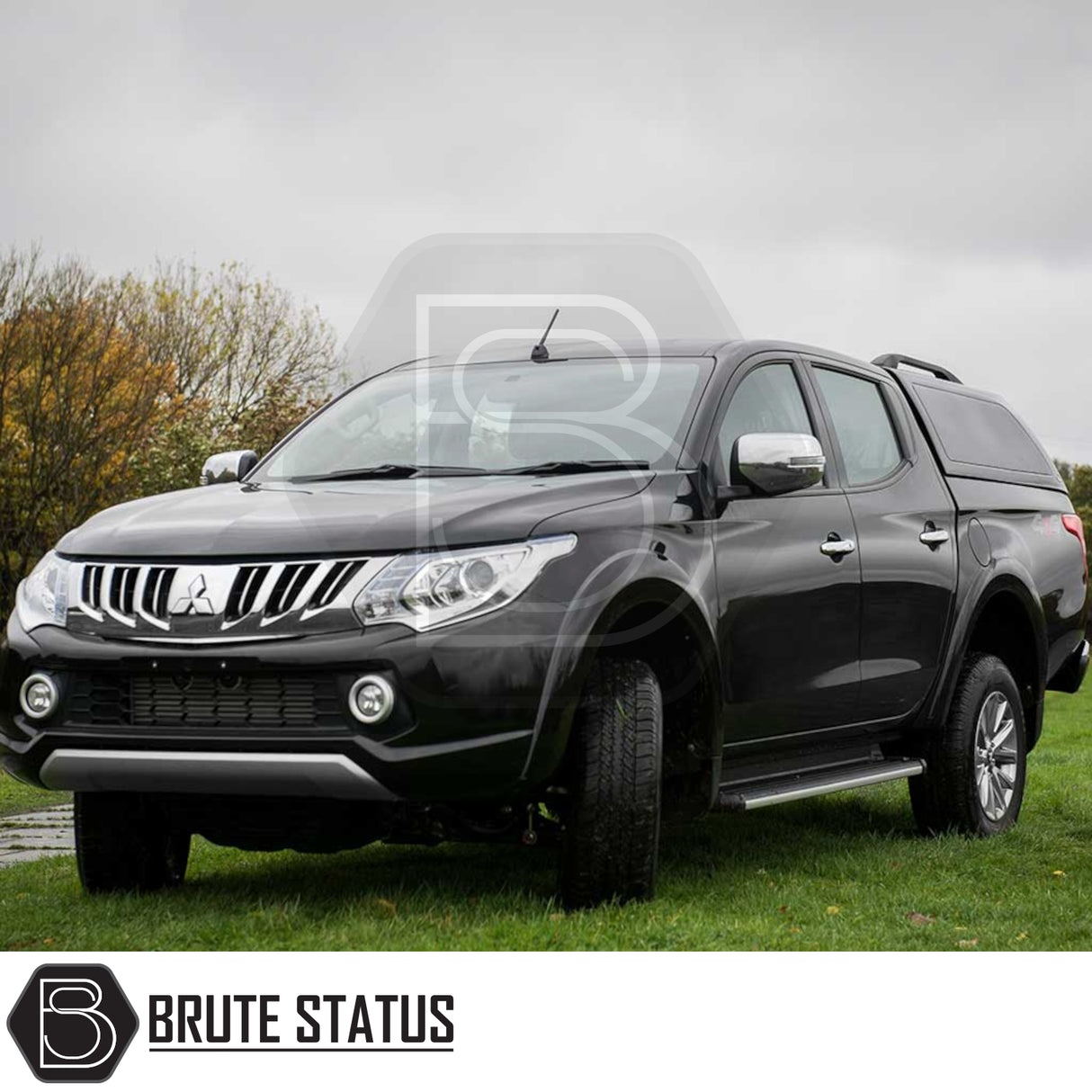 Fiat Fullback/Mitsubishi L200 2015-2021 Truckman RS hardtop canopy with glazed rear window, remote locking, solid sides for enhanced security on a black pickup.