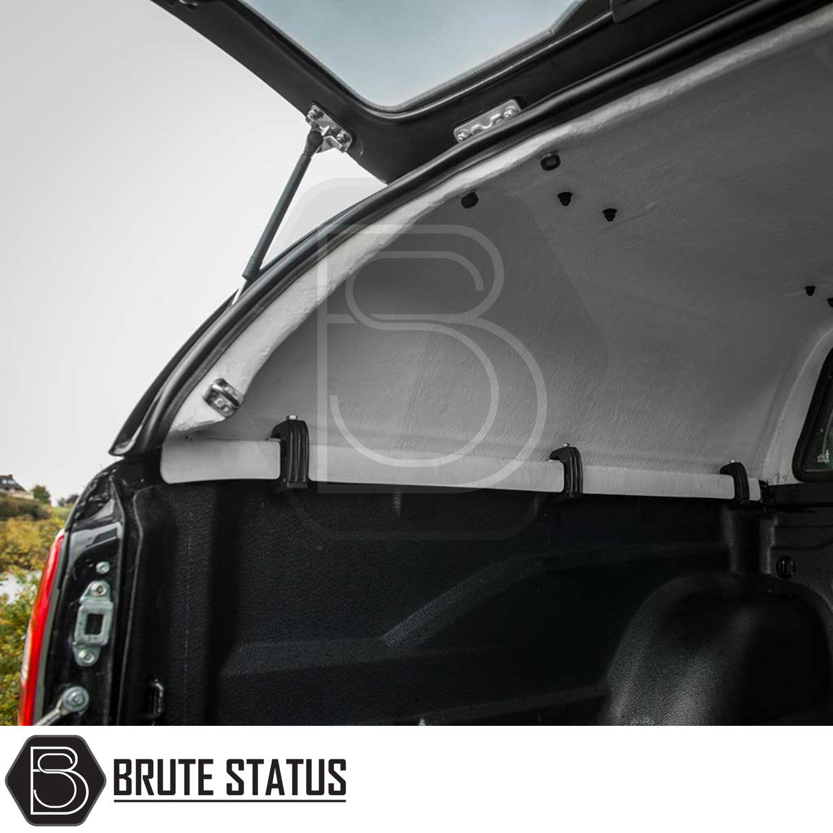 Fiat Fullback/Mitsubishi L200 Truckman RS Hardtop Canopy with open rear hatch, showcasing interior and mounting brackets for enhanced truck bed security and versatility.