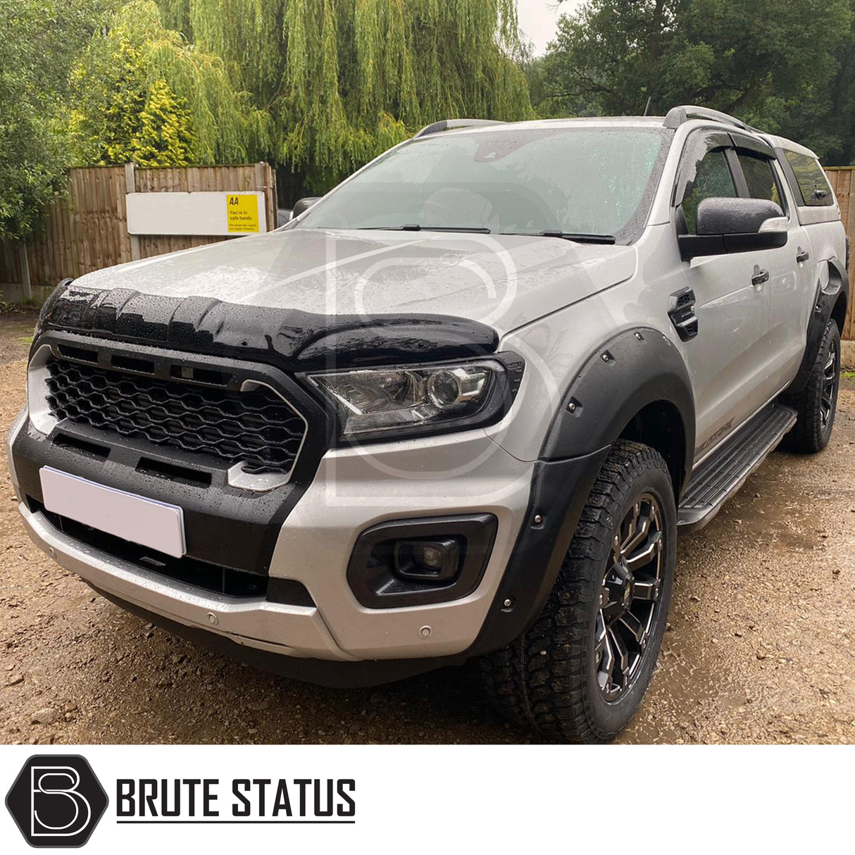 Ford Ranger T8 (2019-2022) non-Wildtrak front grille in black with silver accents, durable ABS plastic, easy installation using existing fastening points, enhances truck’s aggressive front look.