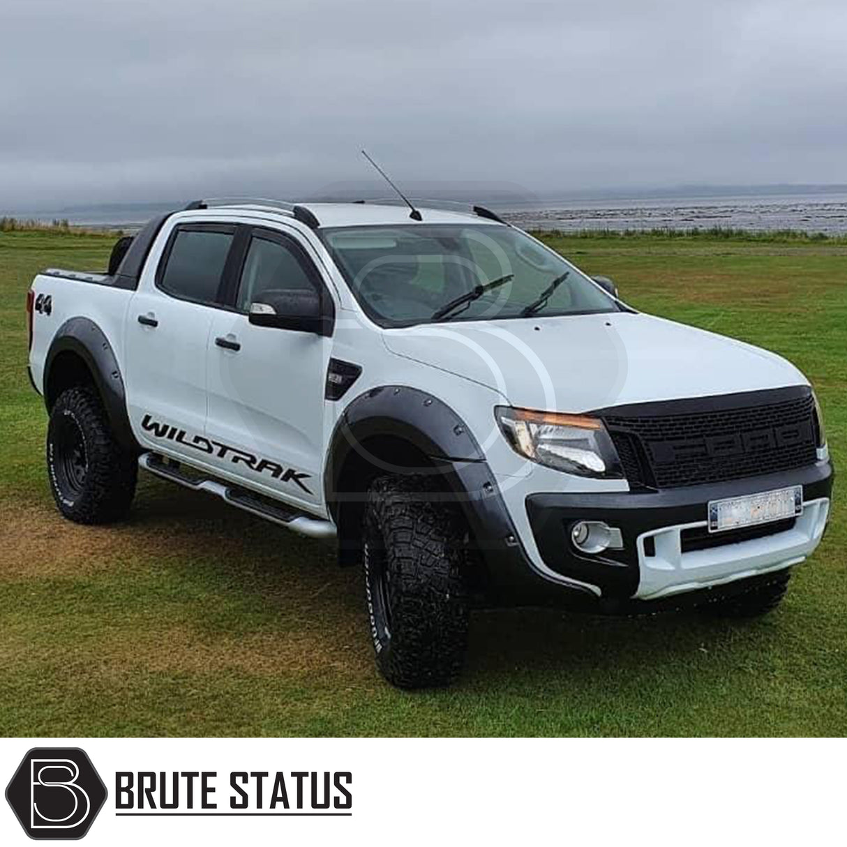 Silver roof rail kit installed on a Ford Ranger 2012–2022, high-quality aftermarket roof rails designed for added cargo and roof rack support.