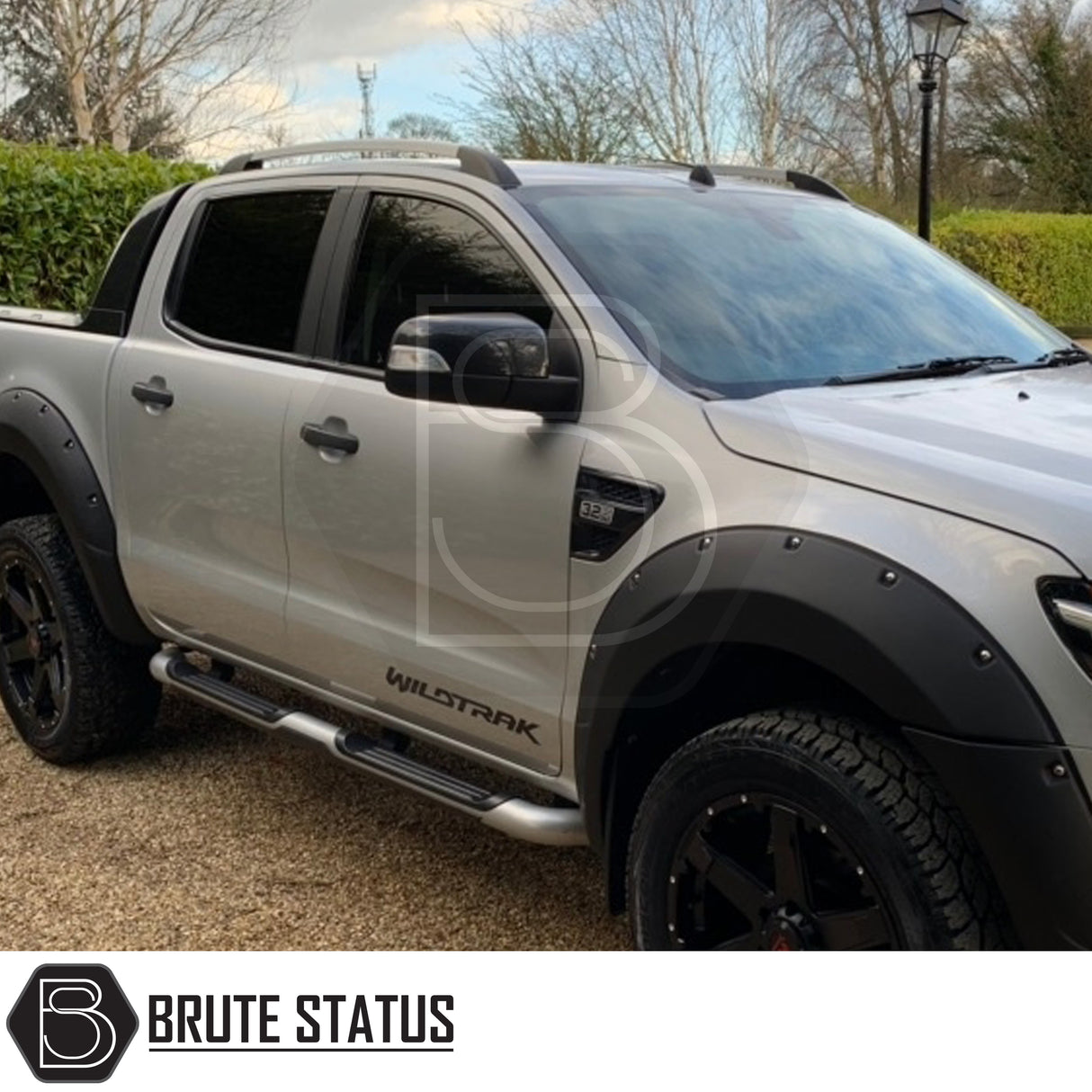 Silver roof rail kit installed on a Ford Ranger 2012–2022, high-quality aftermarket roof rails designed for added cargo and roof rack support.