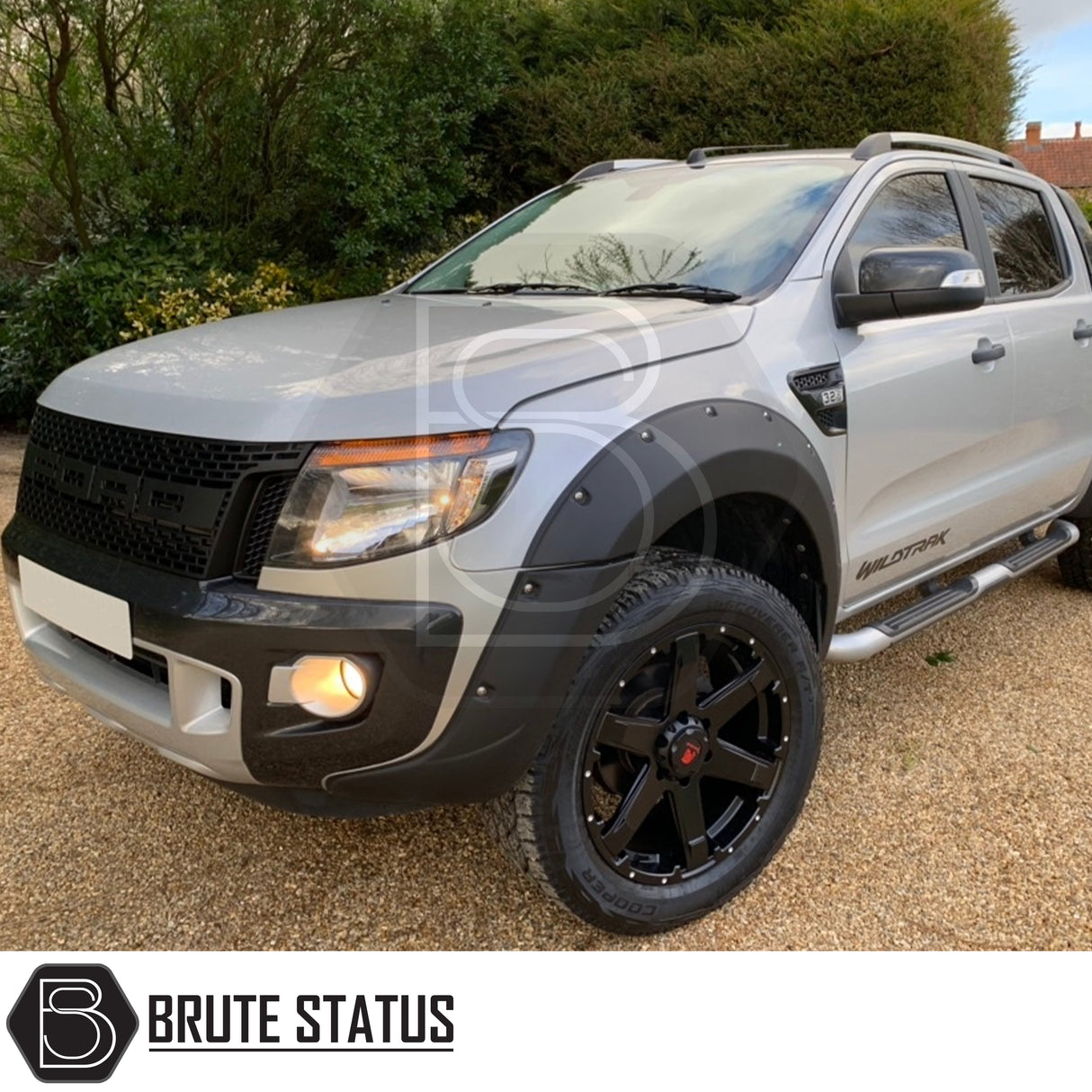 Silver roof rail kit installed on a Ford Ranger 2012–2022, high-quality aftermarket roof rails designed for added cargo and roof rack support.