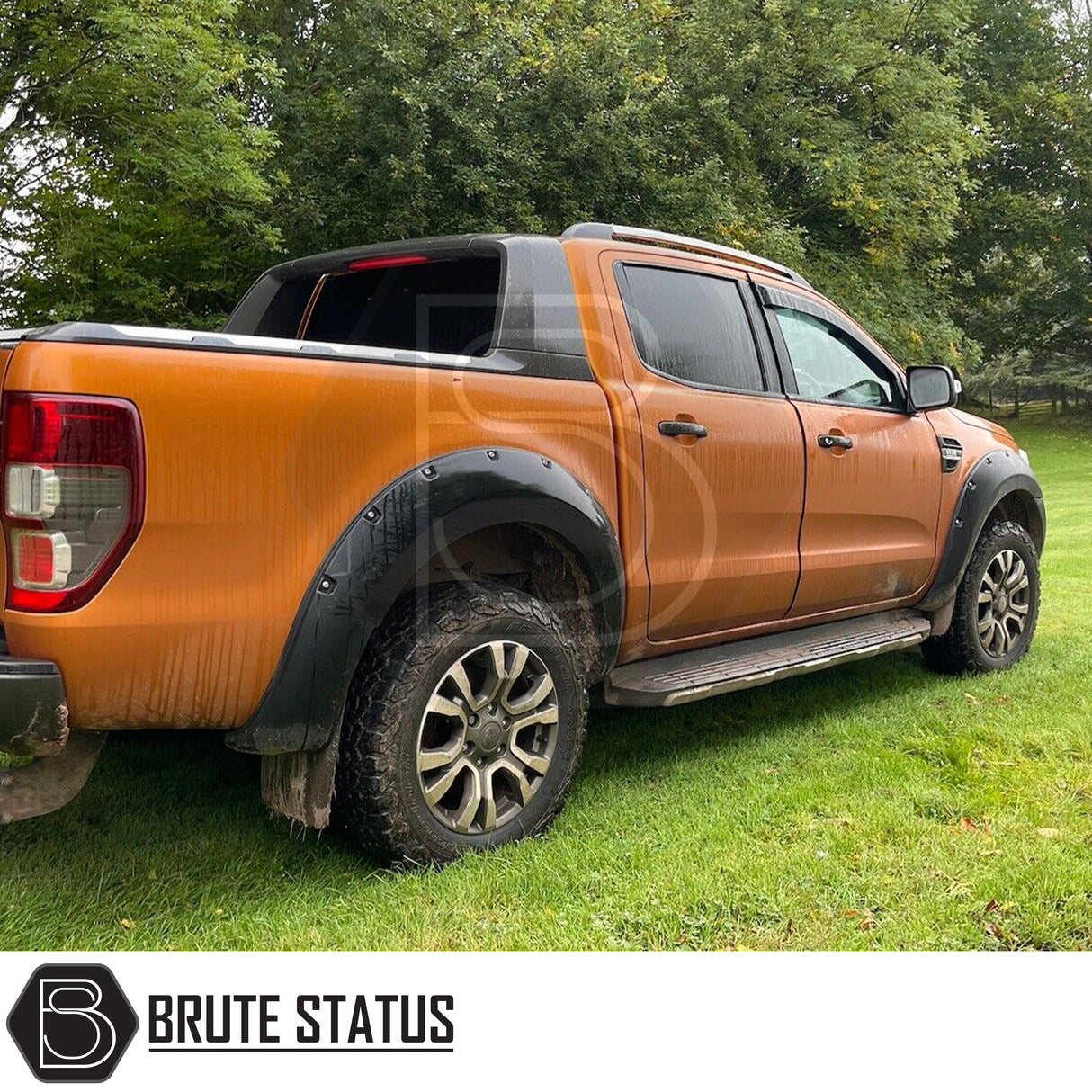 Silver roof rail kit installed on a Ford Ranger 2012–2022, high-quality aftermarket roof rails designed for added cargo and roof rack support.