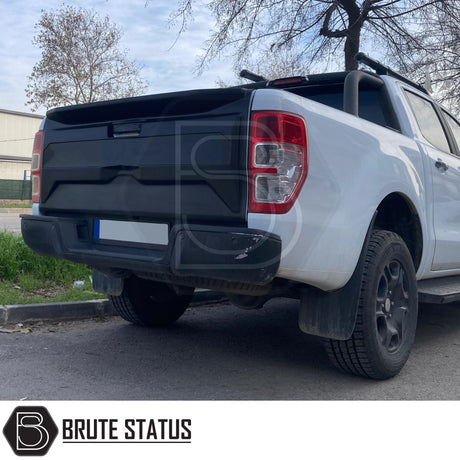 Brute Status matt black tailgate protector for ford ranger t6 t7 and t8 model years 2012-2022 fitted to a white ford ranger