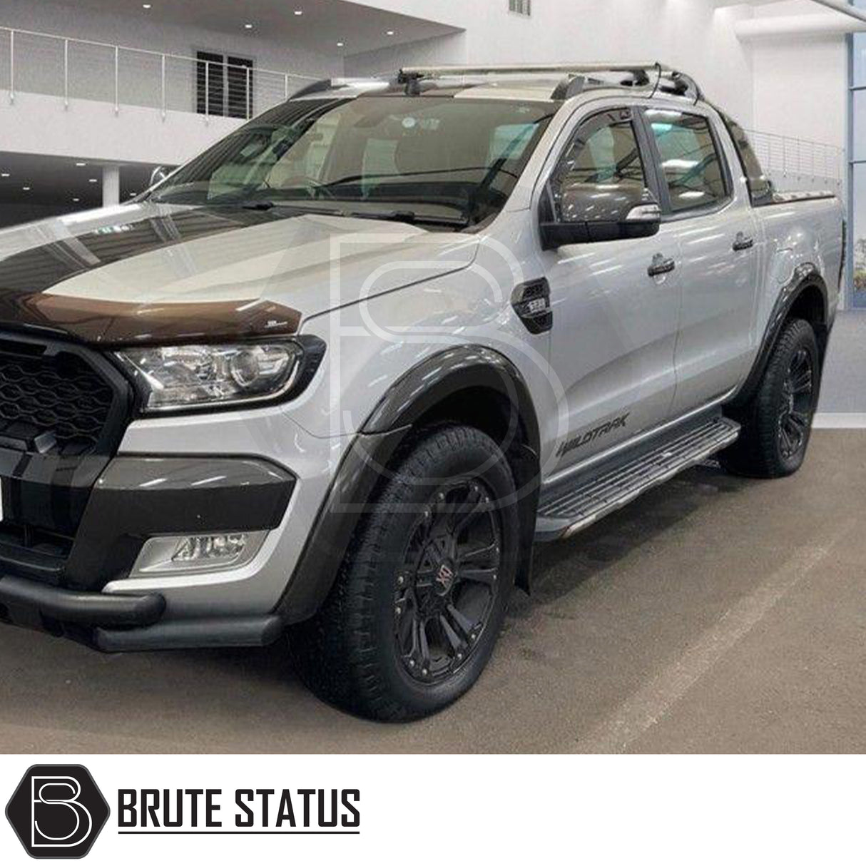Ford Ranger 2012-2022 Smooth Gloss Wide Arch Kit & 35mm Wheel Spacers showcased on a silver Wildtrak, emphasizing enhanced, muscular styling with durable, flex-ready ABS plastic arches.