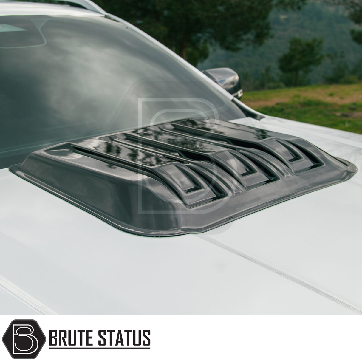 Ford Ranger T9 2023+ Raptor Style Bonnet Scoop Vent Gloss Black, featuring a sleek black hood scoop on a white SUV with Brute Status branding.