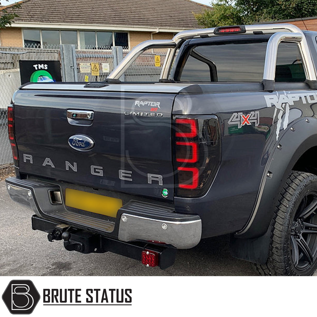 Smoked aftermarket LED tail light units fitted to a 2012–2022 Ford Ranger, showing modern LED illumination and OEM-style fitment from the rear angle.