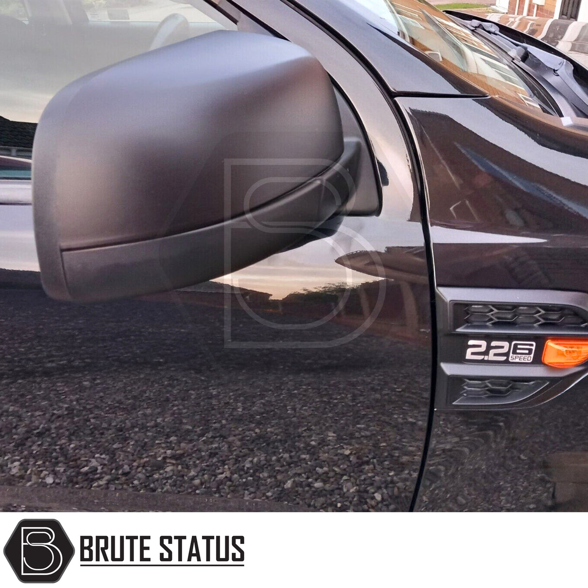High-quality ABS matt black door mirror covers for Ford Ranger 2012-2022 models, fade-resistant and easy to fit using included 3M adhesive tape, sold as a pair.