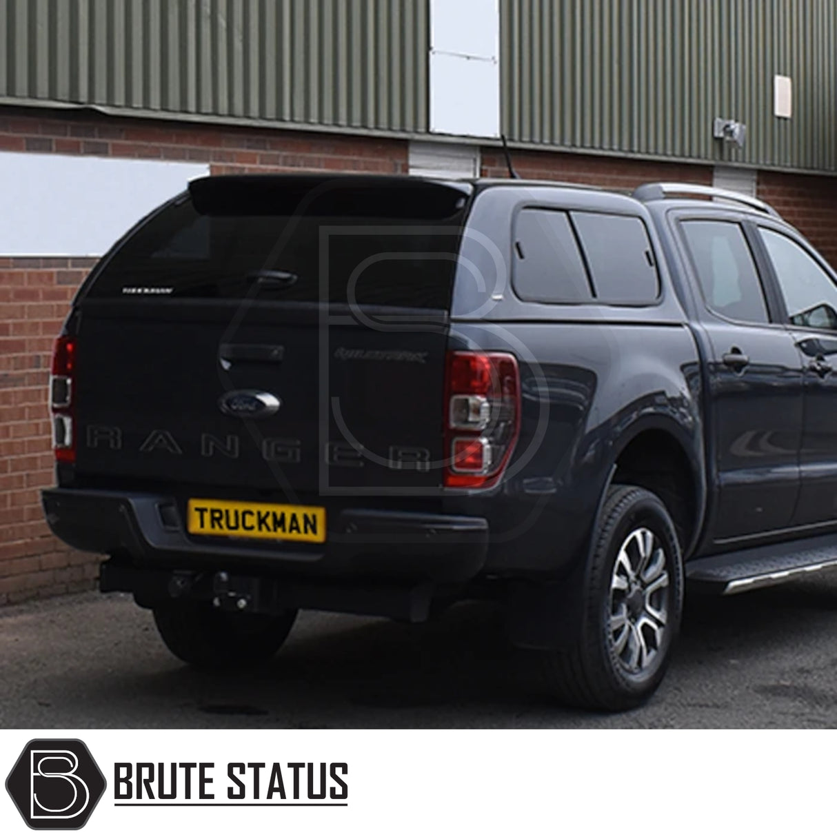Ford Ranger 2012-2022 Truckman GLS Hardtop Canopy with remote locking and roof bars, enhancing storage and security, shown on a parked pickup truck.