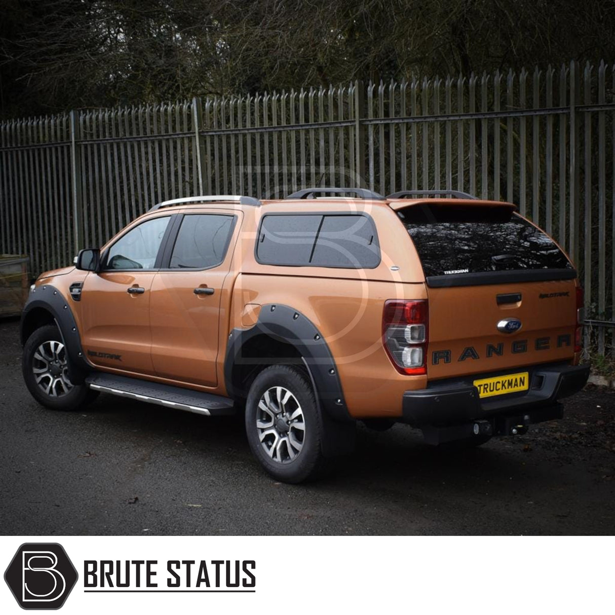 Ford Ranger pickup with Truckman GLS Hardtop Canopy featuring remote locking, roof bars, and tinted windows, enhancing vehicle storage and style.