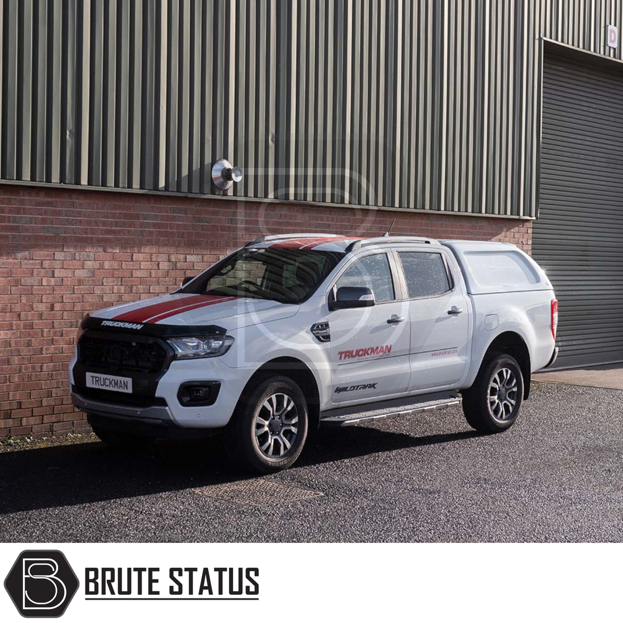 Ford Ranger 2012-2022 Truckman L-Series Hardtop Canopy with remote locking, fitted on a white pickup, featuring black grille and red racing stripes.