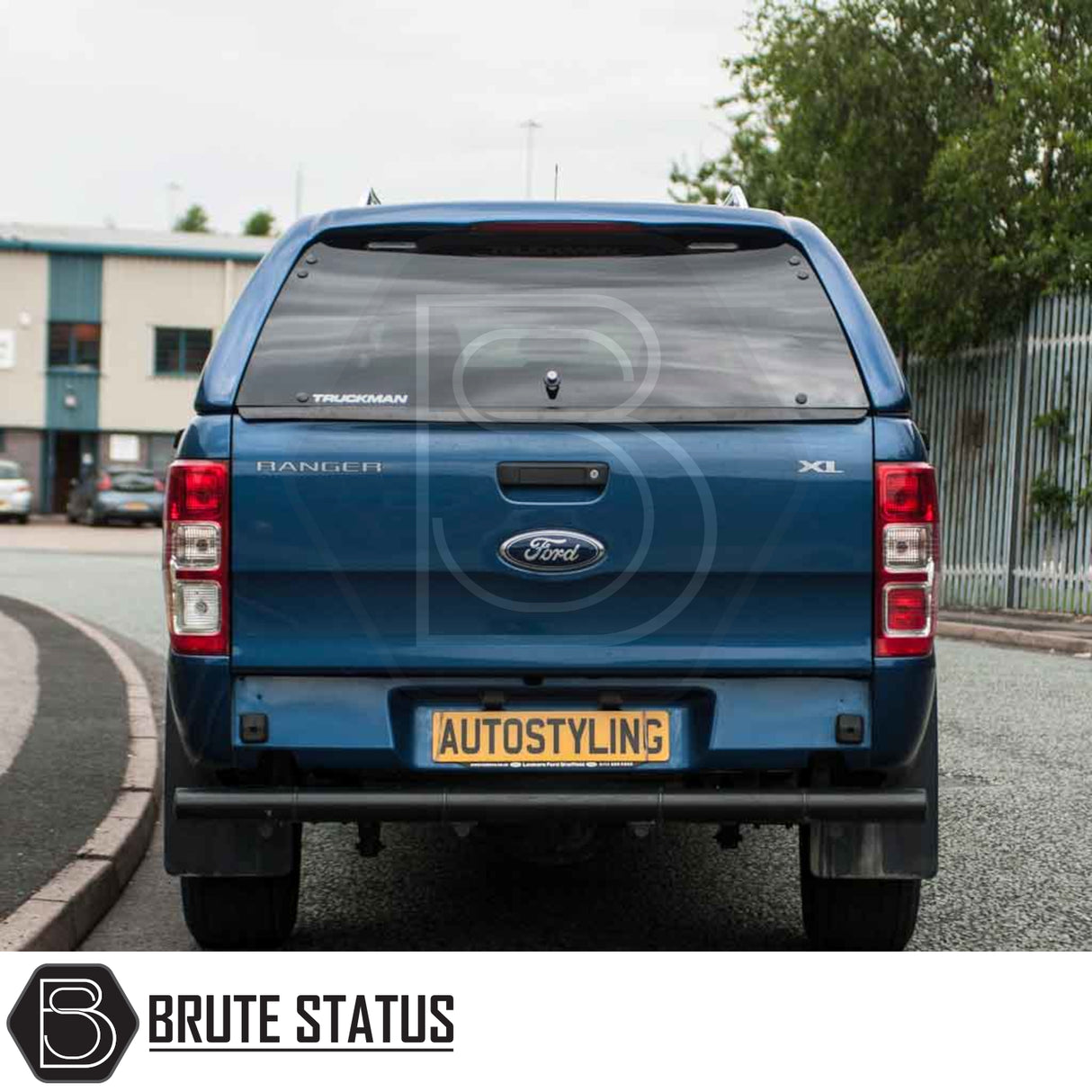 Ford Ranger 2012-2022 Truckman RS Hardtop Canopy with solid rear window, enhancing security and utility, shown on a blue pickup with AUTOSTYLING license plate.