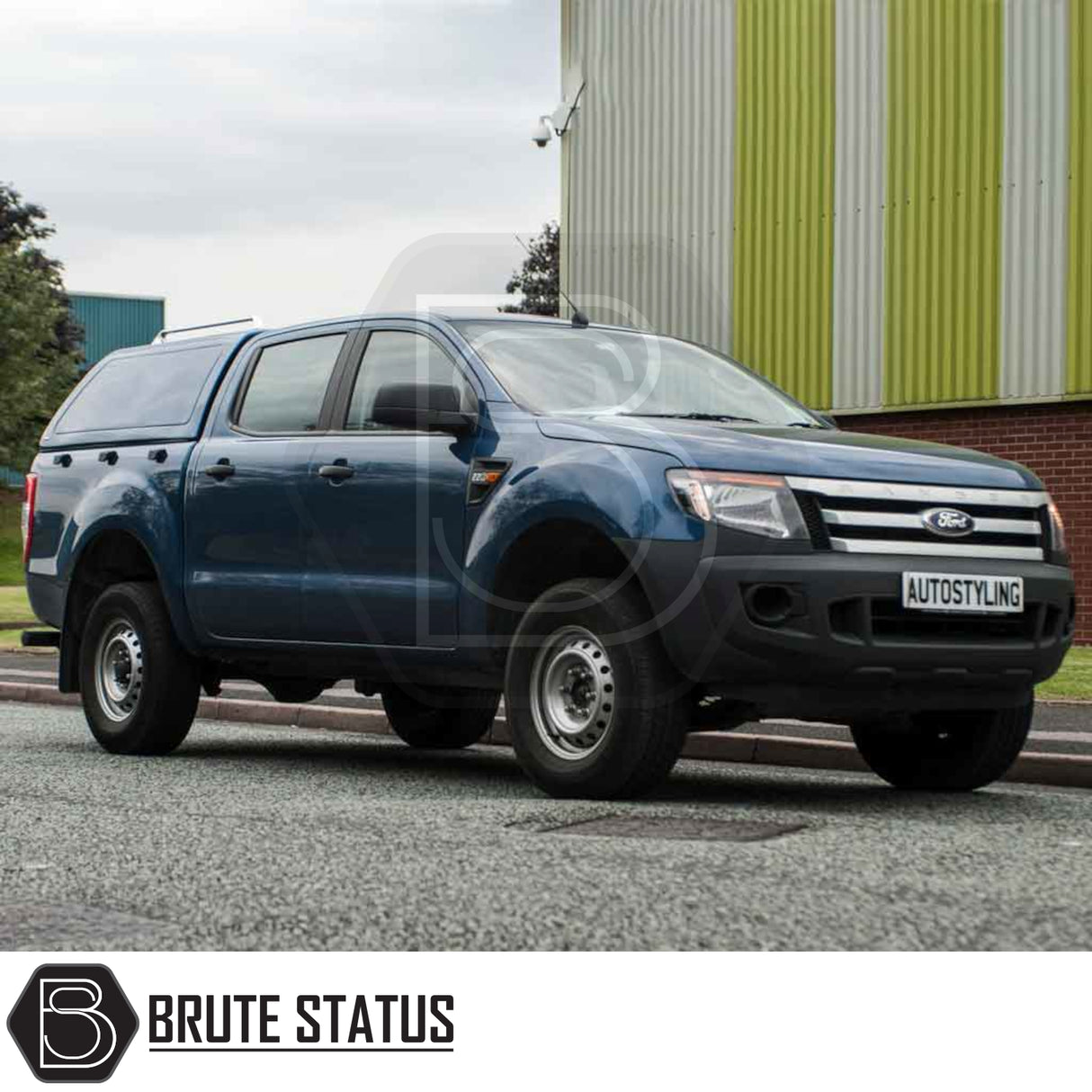 Ford Ranger 2012-2022 Truckman RS Hardtop Canopy with solid rear window on a dark-blue pickup, enhancing security and utility for commercial applications.
