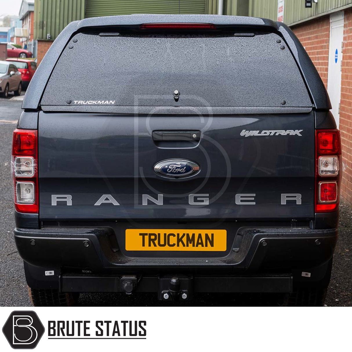 Ford Ranger 2012-2022 Truckman RS Hardtop Canopy with solid rear window on a parked pickup, featuring secure, robust design ideal for commercial use.