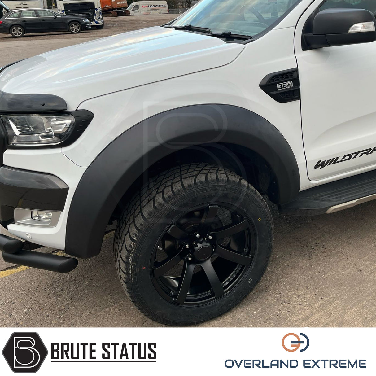Ford Ranger 2012-2022 Wide Arch Kit (Overland Extreme) in showroom, highlighting premium wide wheel arches and large tires, emphasizing durability and precision design.