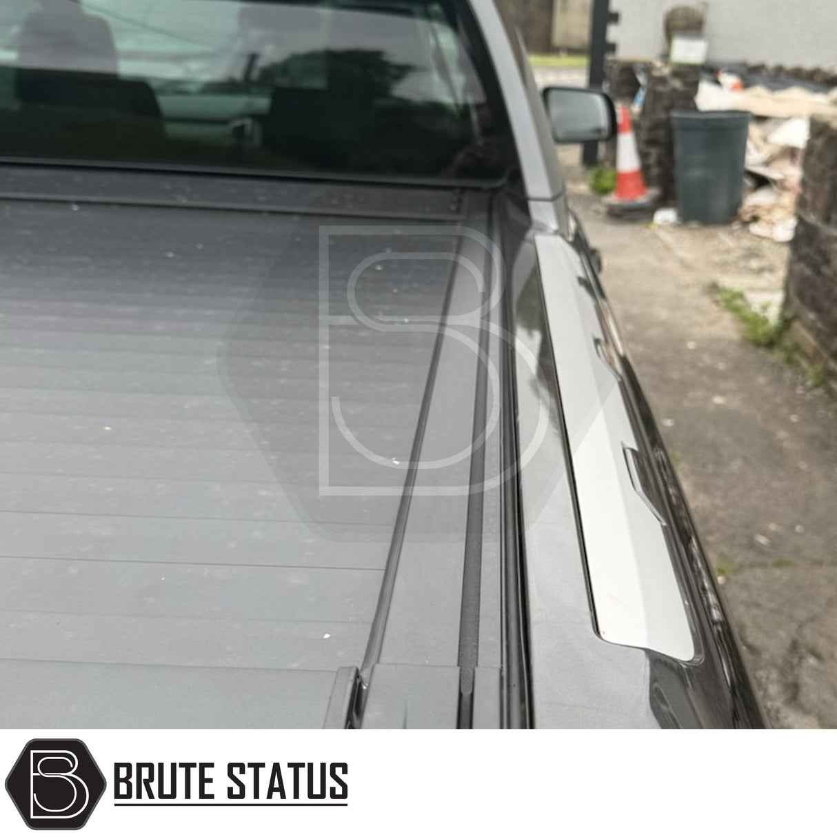 Close-up of Ford Ranger 2012-2022 Wildtrak Manual Roller Shutter showing retractable tonneau cover and side rails, highlighting sturdy design and secure truck bed protection.