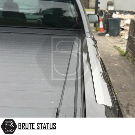 Close-up of Ford Ranger 2012-2022 Wildtrak Manual Roller Shutter showing retractable tonneau cover and side rails, highlighting sturdy design and secure truck bed protection.