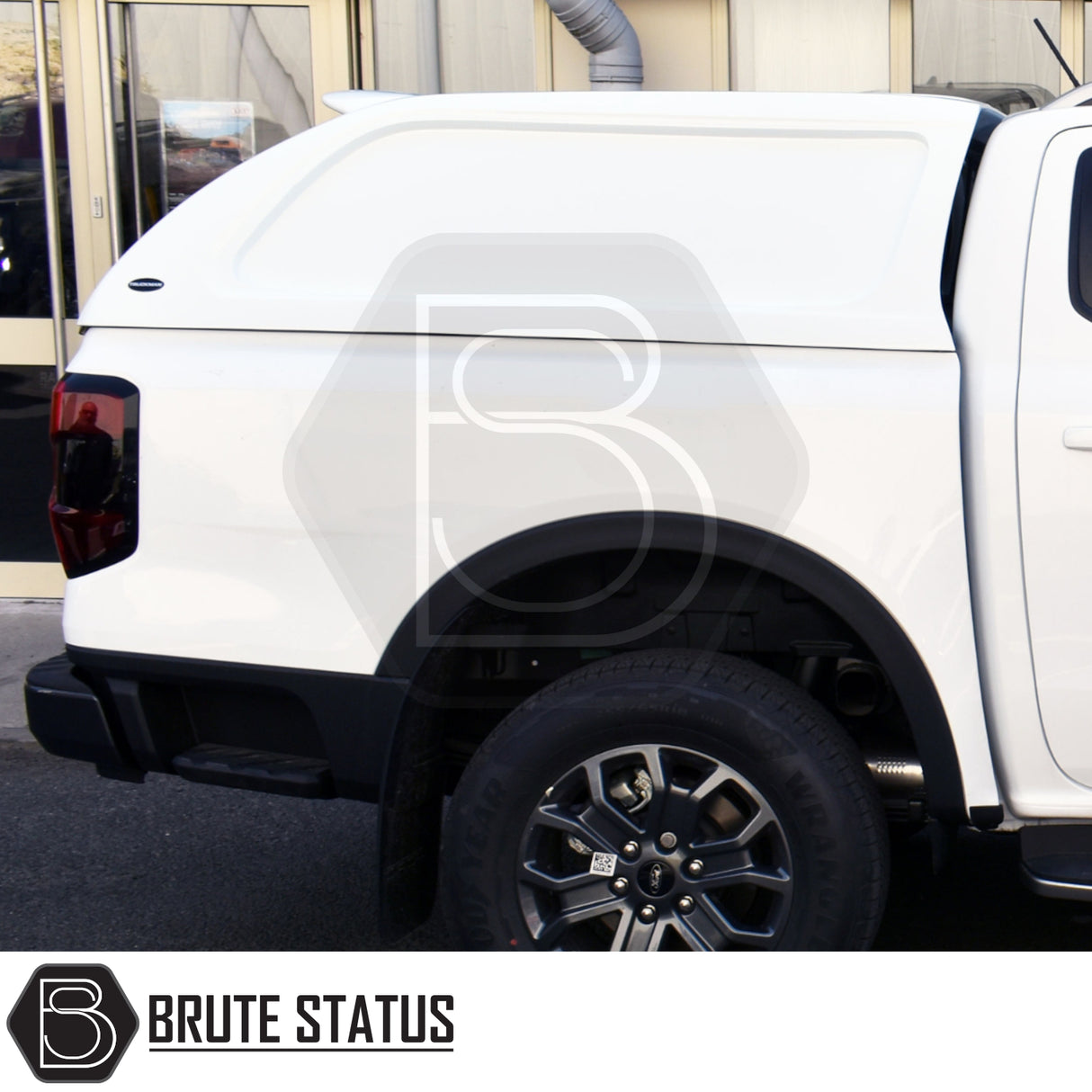 Ford Ranger 2023+ T9 Truckman L-Series Hardtop Canopy with remote locking, showing rear-side view with smooth, solid-sided design and branded by Brute Status.